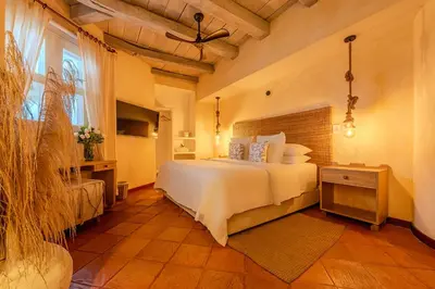 a bedroom with a large white bed in a room at Moet Cartagena Hotel Boutique Adutls Only in Cartagena de Indias