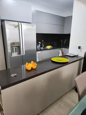 a kitchen with a counter with a yellow plate on it at Hermoso Apto en el corazón de la ciudad amurallada in Cartagena de Indias