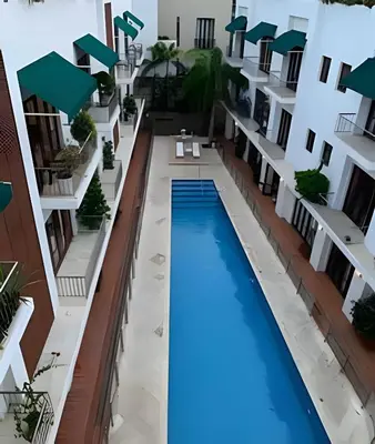 an aerial view of a building with a swimming pool at 212 Cartagena Walled City Magical Apt in Cartagena de Indias