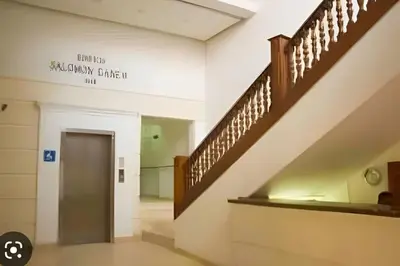 a staircase in a building with a stairway order sign at 417 Apto con vista panorámica de cgna in Cartagena de Indias