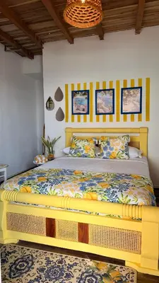 a bedroom with a large bed in a room at Mio Mio Beach in Baru