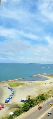 an aerial view of a beach with umbrellas at Cabrero Beach 1212 in Cartagena de Indias