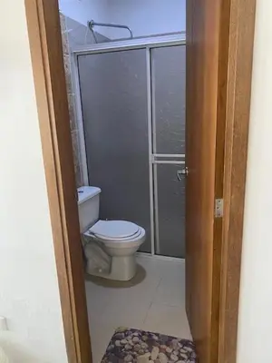 a bathroom with a toilet and a glass shower at Cabañas Paulamar - Apto 2 - Tolu in La Gloria