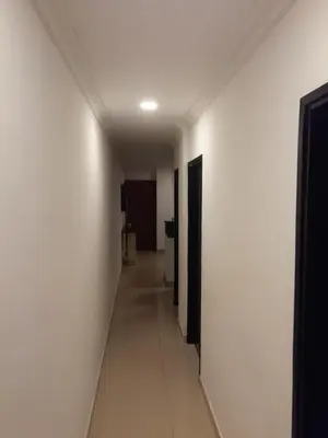 a hallway of a room with white walls and white floors at Apto amoblado barrio Los Alpes Cartagena in Cartagena de Indias