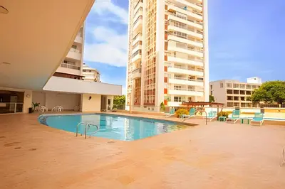 a swimming pool in the middle of a building at Laurdhomes Laguito Loft , Hot Ware, 1Bath in Cartagena de Indias
