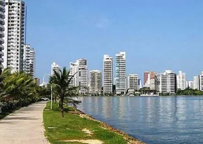 a city with tall buildings and a body of water at Cartagena ApartaSuite El Laguito in Cartagena de Indias