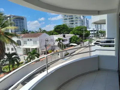 a balcony with a view of a city at Condominio en la Playa de Crespo in Cartagena de Indias