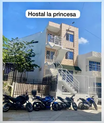 a group of motorcycles parked in front of a building at Hostal La Princesa in Cartagena de Indias