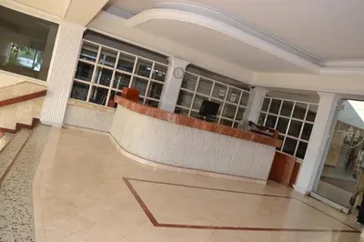 a lobby of a building with a counter in it at Apartamento 3 Carabelas Cartagena Piso 16 in Cartagena de Indias