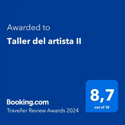 a blue screen with the text awarded to talile del artistico ii at Taller del artista II in Cartagena de Indias