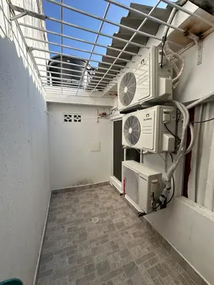 an empty room with a room with a fan at APARTAMENTO in Cartagena de Indias