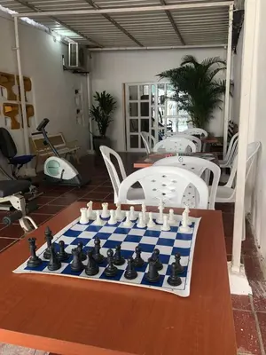 a chess board on a table in a room at Martinica Hostel in Cartagena de Indias
