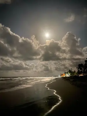 a view of a beach with the sun in the sky at Arcoiris EcoHotel in San Bernardo del Viento