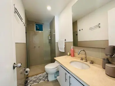a bathroom with a toilet and a sink and a shower at MORROS EPIC 1111 in Cartagena de Indias