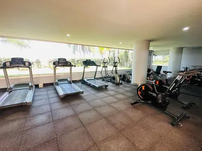 a gym with several tread machines and a large window at MORROS EPIC 1111 in Cartagena de Indias