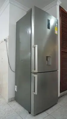 a stainless steel refrigerator sitting in a room at Azul de Bocagrande in Cartagena de Indias