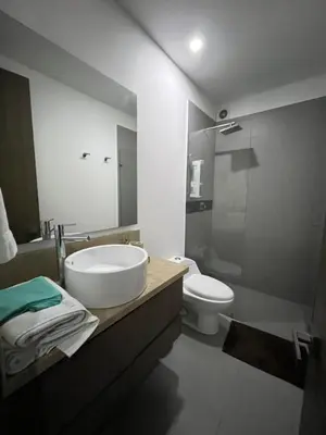 a bathroom with a sink and a toilet at Morros Cartagena junto al Hotel las Américas Edificio Spiaggia salida a playa in Cartagena de Indias