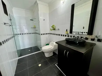 a bathroom with a sink and a toilet and a shower at Casa palma Cartagena de Indias, Colombia in Cartagena de Indias
