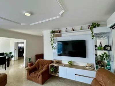 a living room with a flat screen tv on a wall at Casa palma Cartagena de Indias, Colombia in Cartagena de Indias