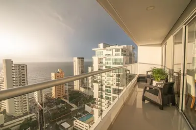 an apartment balcony with a view of the ocean at La mejor vista al mar y ubicacion en Cartagena in Cartagena de Indias