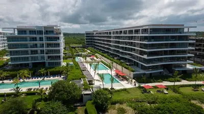a resort with a pool and two tall buildings at Apartamento de Lujo Morros Zóe - Manzanillo - Cartagena in Cartagena de Indias