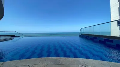 a swimming pool on the side of a building at TU VISTA IDEAL in Cartagena de Indias