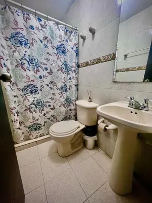a bathroom with a toilet and a sink at Apartamento encanto in Cartagena de Indias