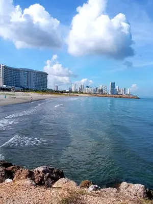 a view of a beach with a city in the background at Apartamento encanto in Cartagena de Indias