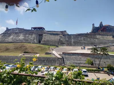 a parking lot in front of a castle at casa castillo san felipe in Cartagena de Indias