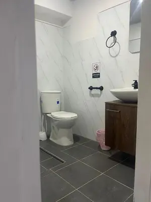 a bathroom with a toilet and a sink at Hospedaje Casa Pachi en Cartagena de Indias in Cartagena de Indias