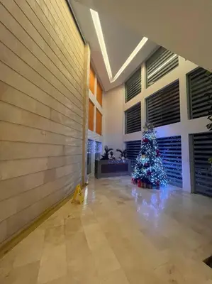 a room with a christmas tree in a room at Apartamento con vista al mar in Cartagena de Indias