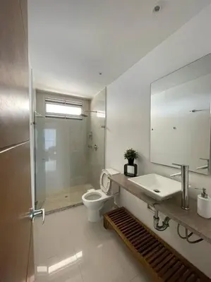 a bathroom with a shower and a toilet and a sink at Apartamento con vista al mar in Cartagena de Indias