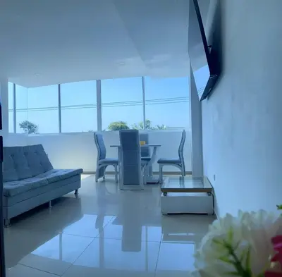 a living room with a couch and a table at Apartamento 301 in Cartagena de Indias