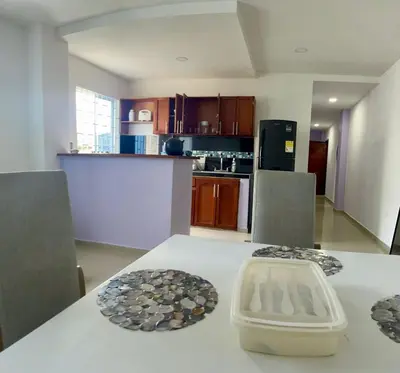 a kitchen with a table with a plate on it at Apartamento 204 in Cartagena de Indias