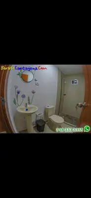 a bathroom with a toilet and a sink at Apartamento 303 in Cartagena de Indias