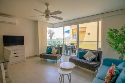 a living room with a couch and a tv at MORROS 922 APTO 3 ALCOBAS in Cartagena de Indias