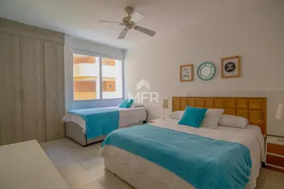 a bedroom with two beds and a window at MORROS 922 APTO 3 ALCOBAS in Cartagena de Indias