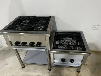 two stove tops sitting next to each other at Habitación confortable y terraza Hamacas Coveñas in Coveñas