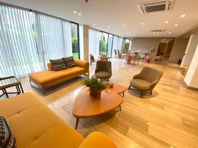 a living room with couches and chairs and a table at Espectacular frente al Mar- Morros Zoe - Playa Manzanillo Cartagena in Cartagena de Indias