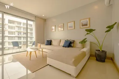 a living room with a couch and a table at Wynwood Morros Eco in Cartagena in Cartagena de Indias