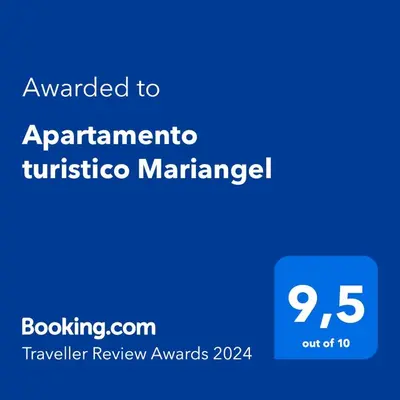 a blue sign with the text awarded to apartmenttnc marriage at Apartamento turistico Mariangel in Cartagena de Indias