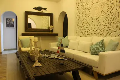 a living room with a couch and a coffee table at Hotel Casa Agustina in Cartagena de Indias