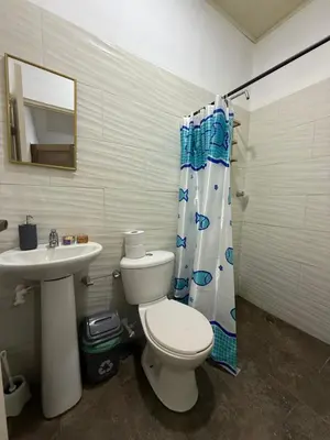 a bathroom with a toilet and a sink at Apartaestudio en Tolú - Itze solaris in Tolú