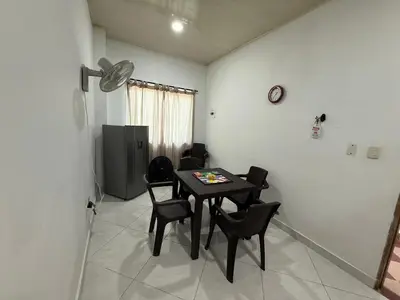 a dining room with a table and chairs at Apartaestudio en Tolú - Itze solaris in Tolú