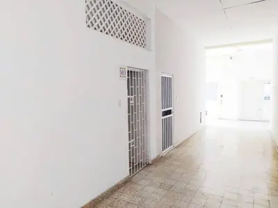 an empty room with white walls and a hallway with doors at Apartamento centro histórico 303-2 in Cartagena de Indias