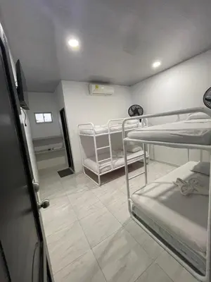 a hospital room with two bunk beds in it at HOTEL HOUSE San Antero Córdoba in San Antero