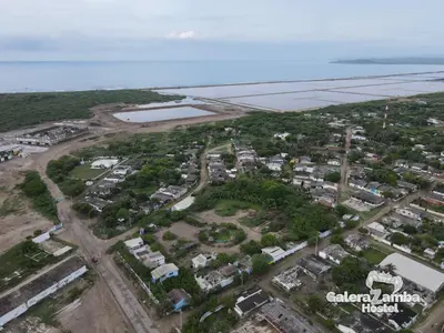 an aerial view of a city and the ocean at Mar Rosa Galerazamba Hostal in Galerazamba