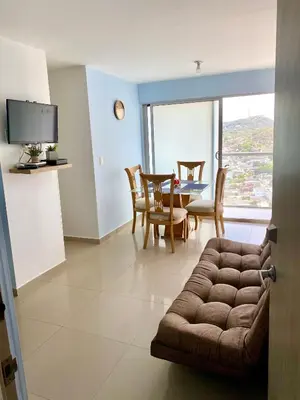 a living room with a couch and a table at Apartamento en Cartagena, Entero y Amueblado in Cartagena de Indias
