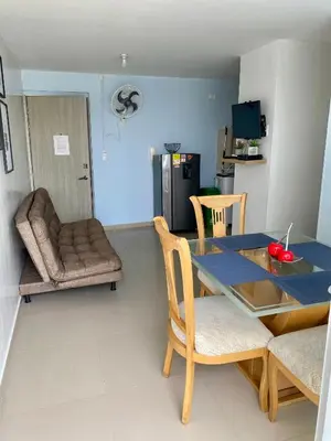 a kitchen and dining room with a table and chairs at Apartamento en Cartagena, Entero y Amueblado in Cartagena de Indias