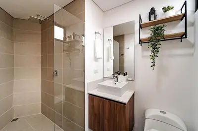 a bathroom with a sink and a toilet and a shower at Apartamento ubicado en, LAURELES, MEDELLIN in Cartagena de Indias